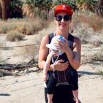 mother with baby in carrier on 1000 Palms - Palm Springs hikes with a baby