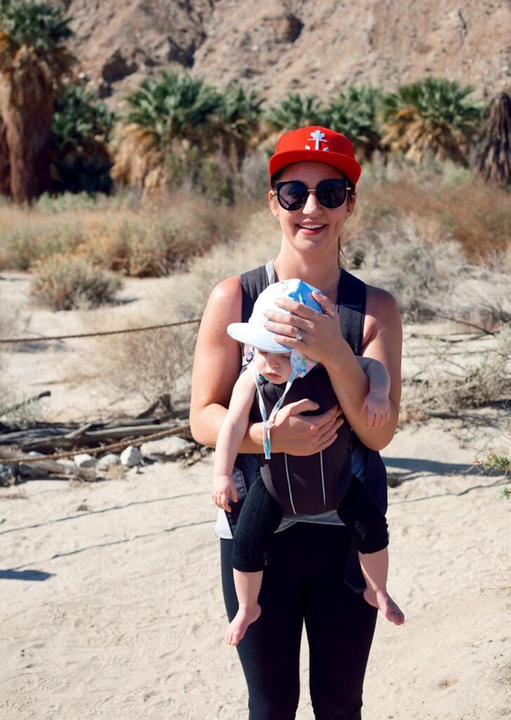 mother with baby in carrier on 1000 Palms - Palm Springs hikes with a baby