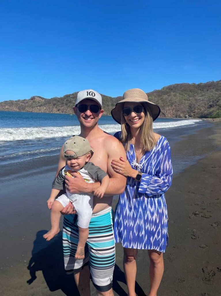 family on the beach in Costa Rica with 11 month old