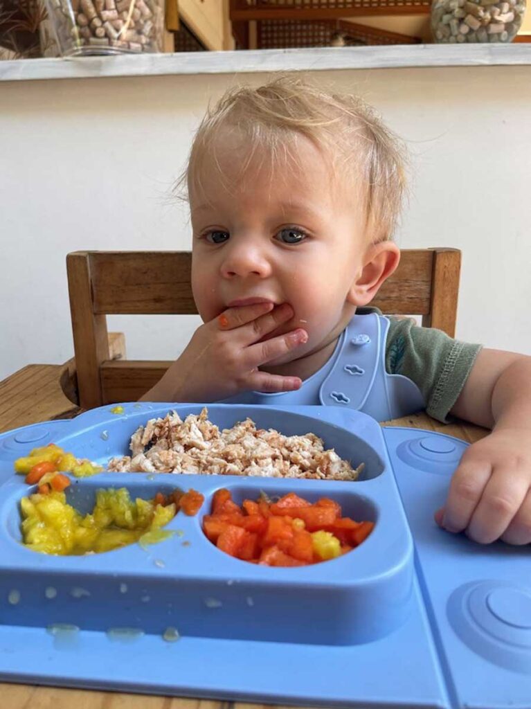 toddler eating in Restaurant in Costa Rica