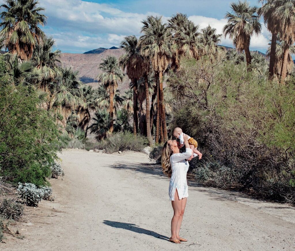 mother holding baby - Indian Canyons Palm Springs