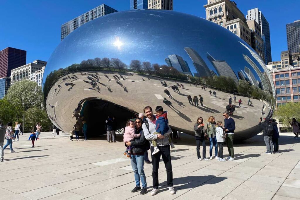 family in front of the bean in Chicago