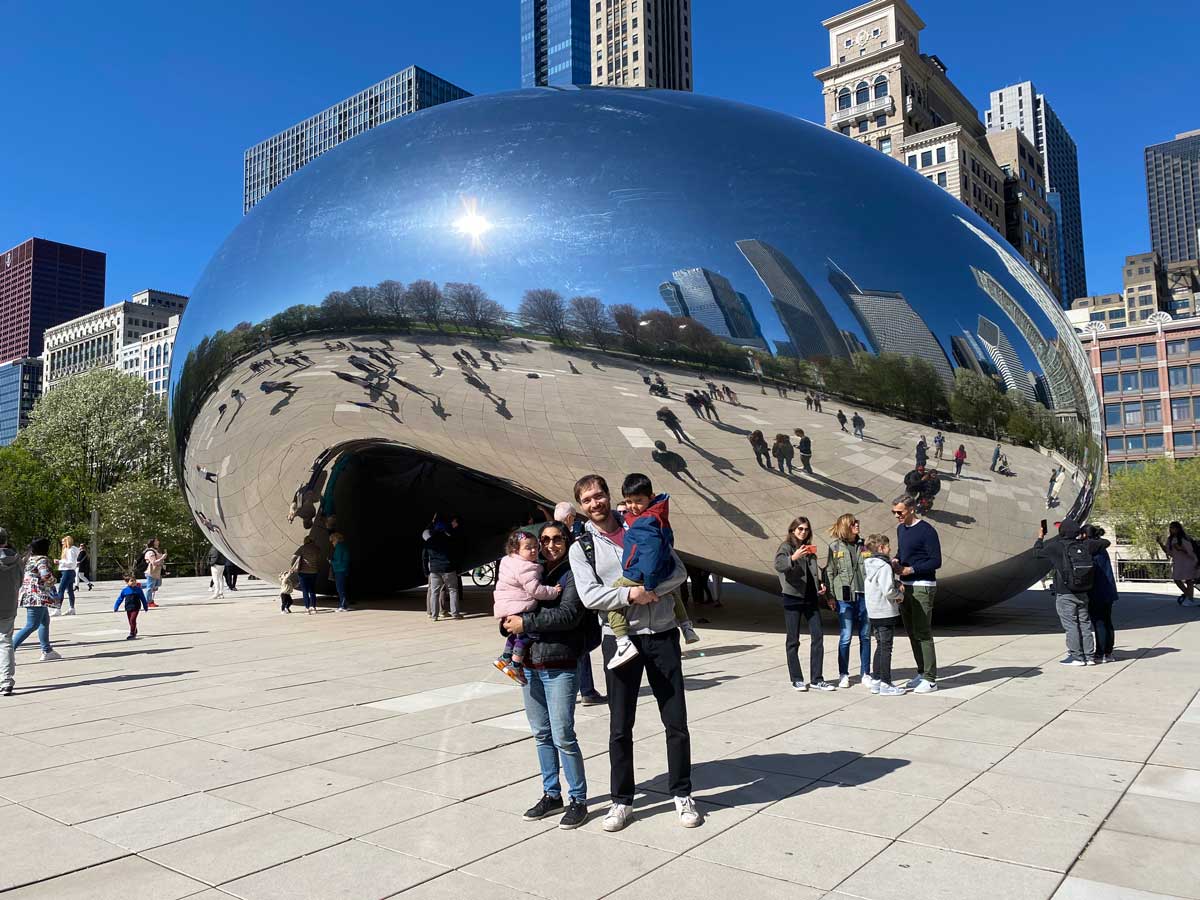 family in front of the bean in Chicago