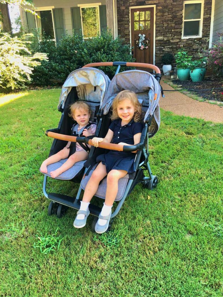 baby and toddler in Zoe Double Stroller XL2