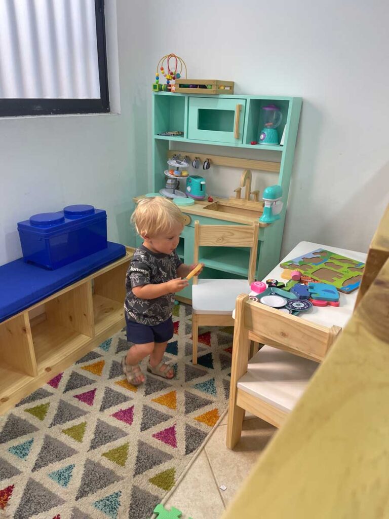 toddler playing in in toy room in Costa Rica - toddler activiites