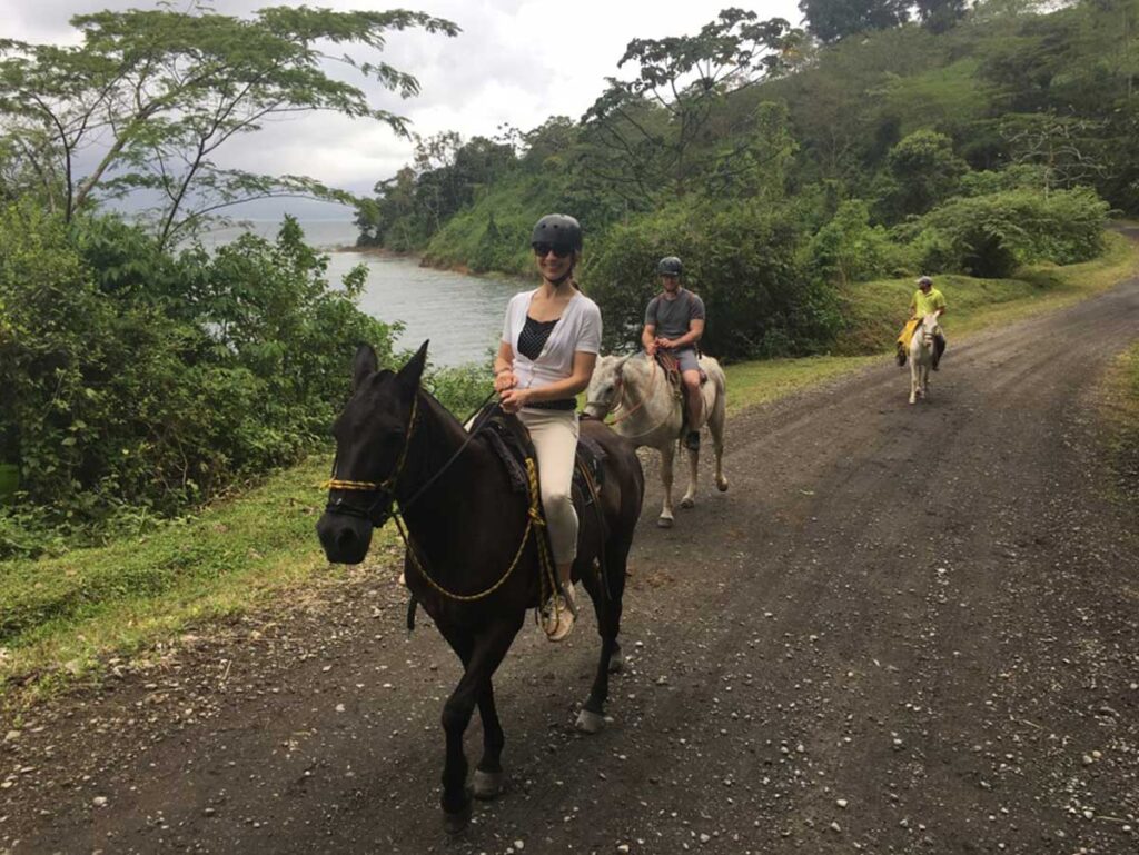 woman horse back riding in Costa Rica