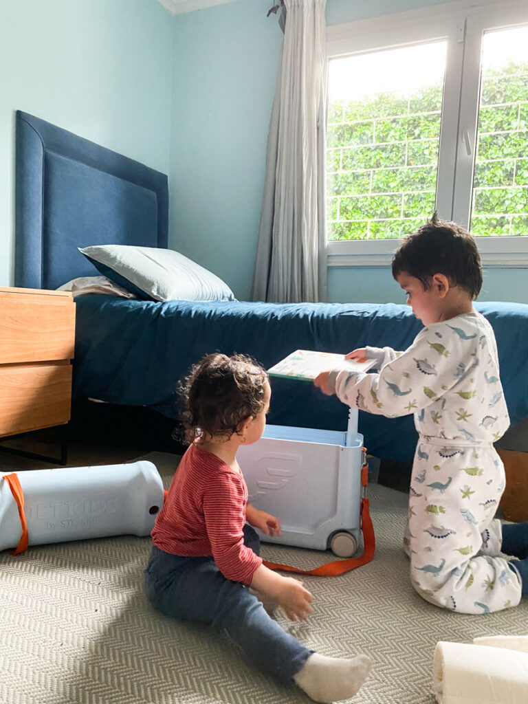 children playing with jetkids bedbox by stokke in bedroom