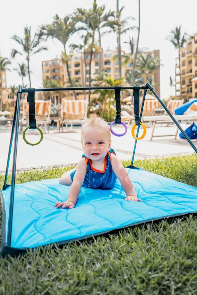 baby playing on A to Z Adventure Gear Lay and Play Mat