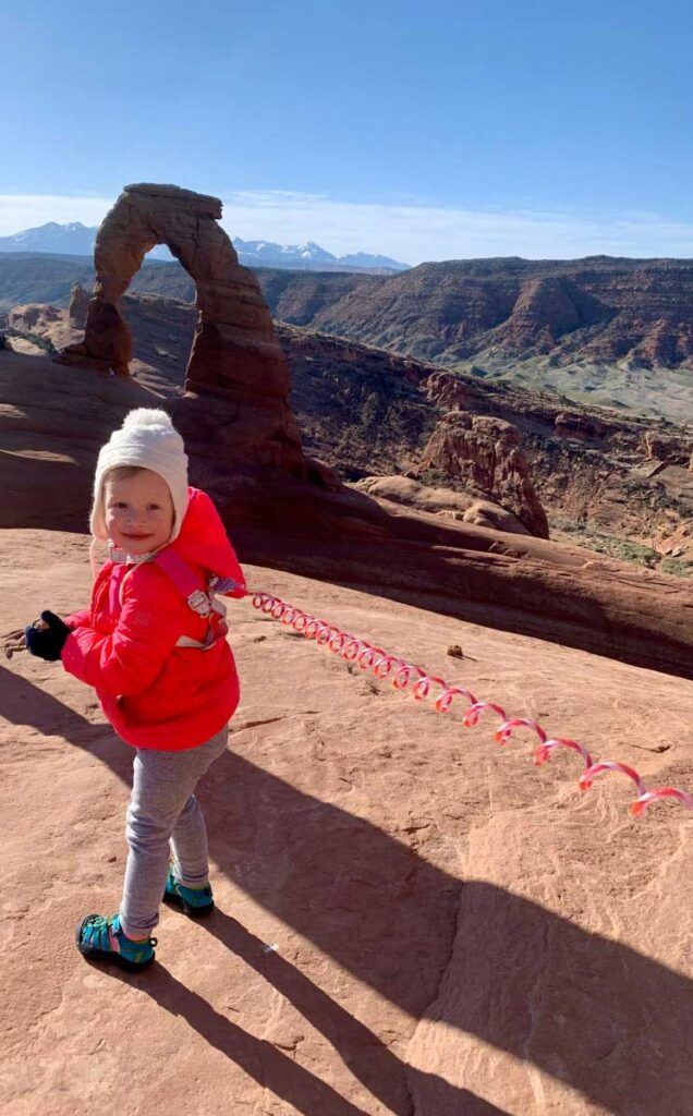 Delicate arch with a toddler