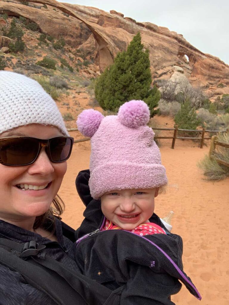 Using toddler carrier for Pine Tree Arch and Tunnel Arch Trail - toddler hikes in Arches National Park