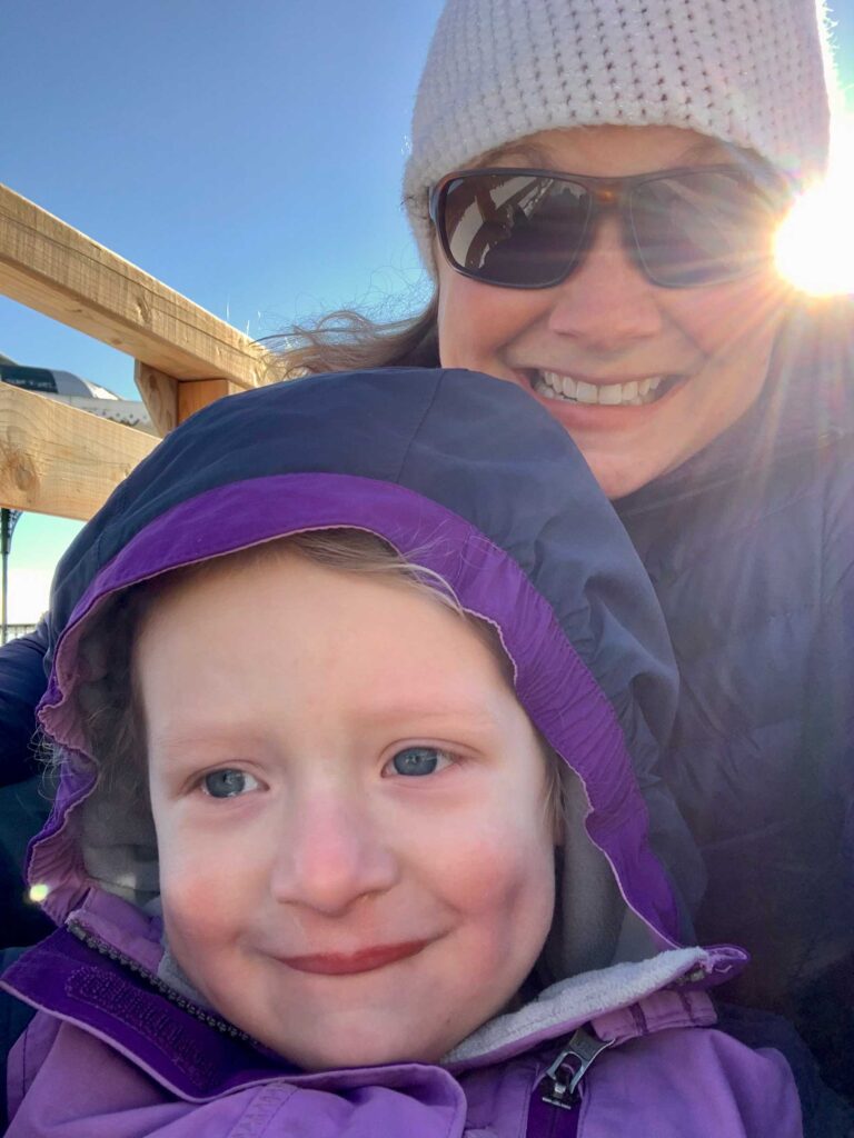 1884 toboggan with toddler in Quebec City in winter