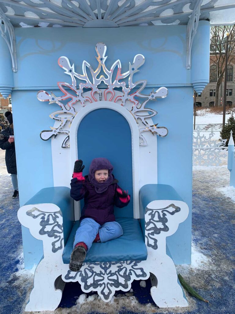 Toddler at Christmas Market in Quebec City in Winter