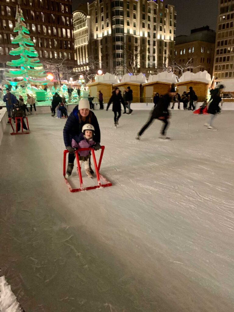 Ice skating with toddler at Place d'Youville - visiting Quebec in winter with toddler