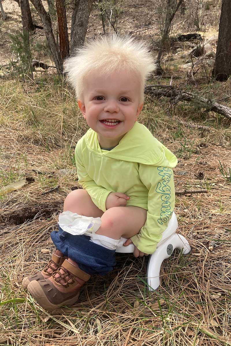 Toddler on travel potty OXO