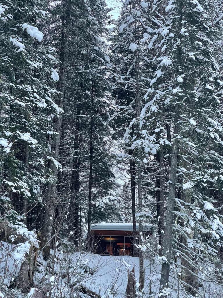 Snow covered cabin in Jaques Cartier National Park