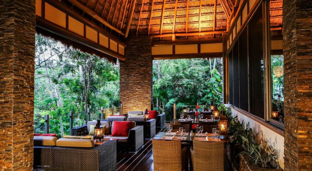 A restaurant has a tropical feel at the all-inclusive Grand Velas Riviera Maya resort near Playa del Carmen, Mexico.