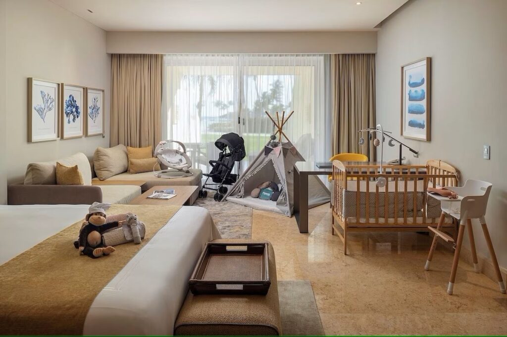 A room at the Grand Velas Riviera Maya includes many baby-friendly amenities such as a crib.