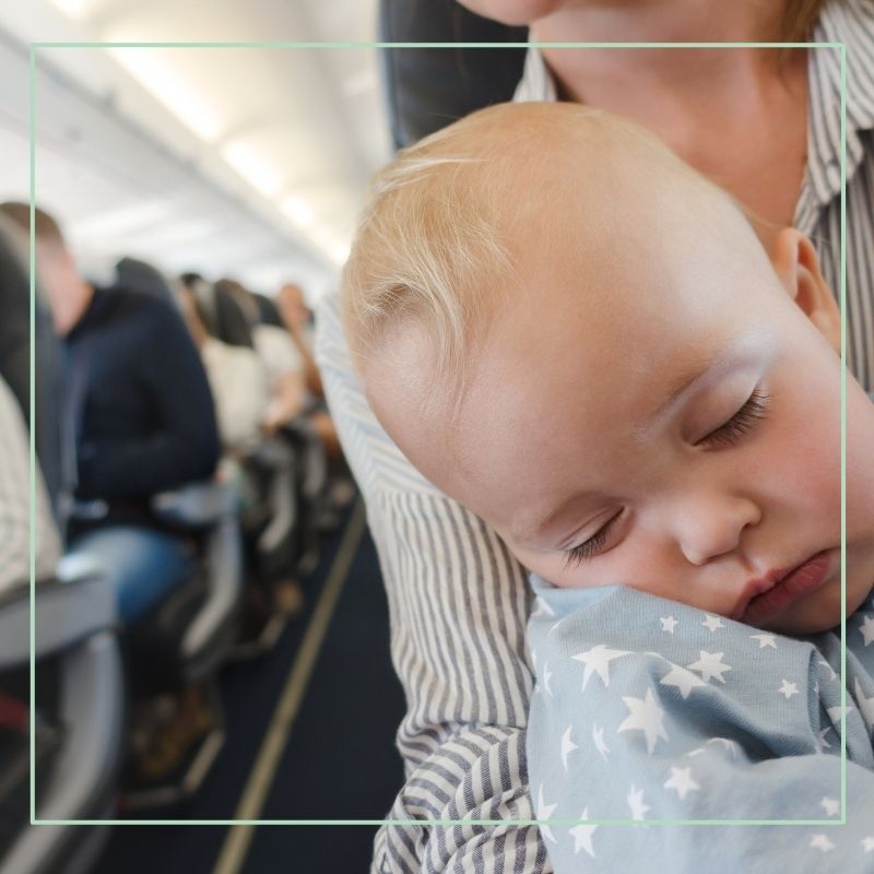 lap infant sleeping on flight