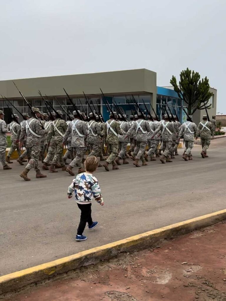 toddler marching with soldiers at Fortaleza del Real Filipe with toddlers in Lima