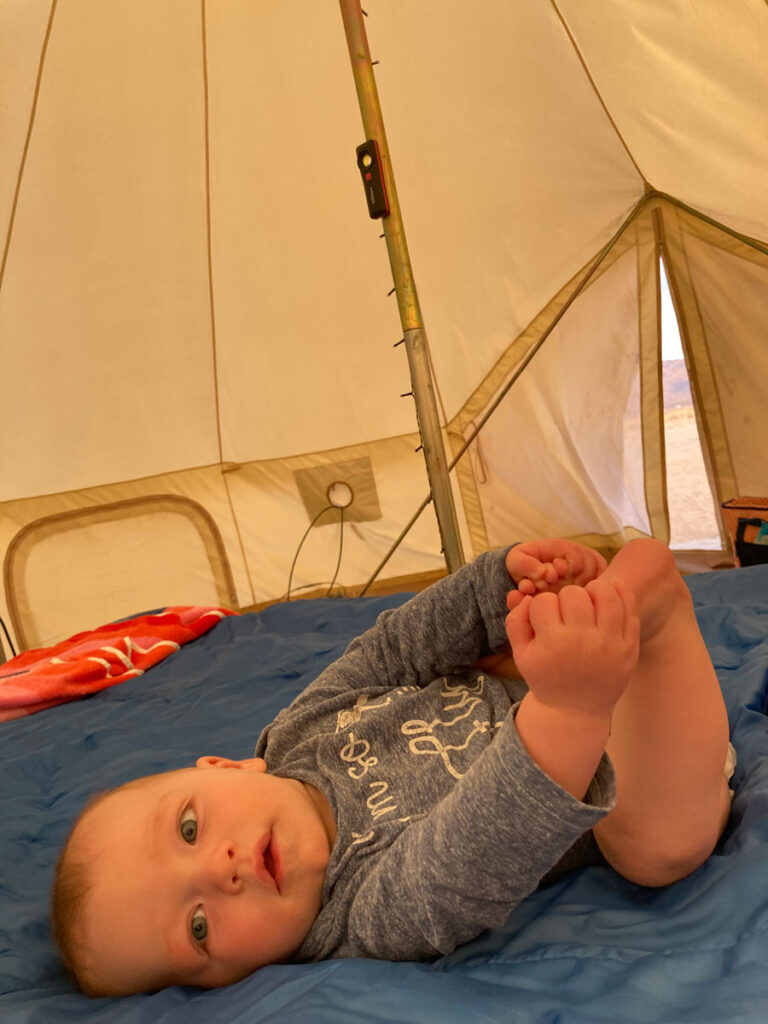 baby on bed - Glamping in Joshua Tree with a Baby