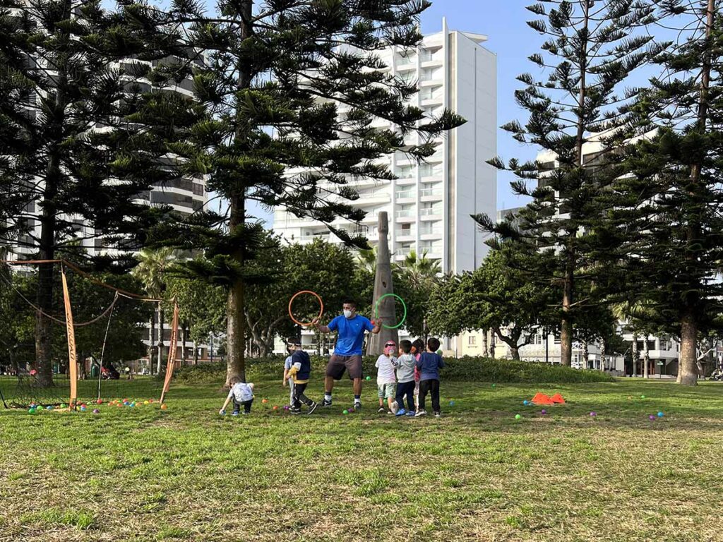 children in Malecon playing Soccer