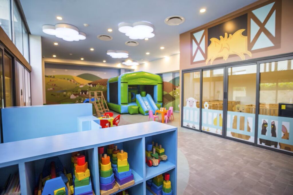 colorful baby toys on display at the baby club at the Sensira Resort & Spa Riviera Maya.