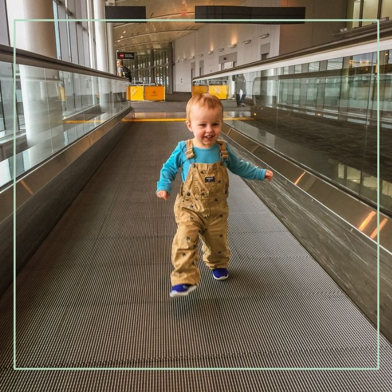 toddler running in airport