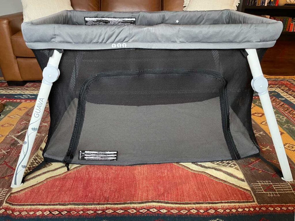 lotus travel crib with side door closed