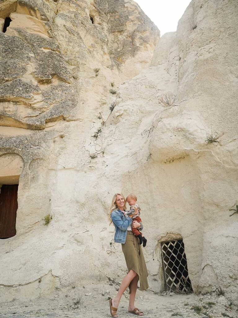 Mother holding baby at Open Air Museum in Cappadocia