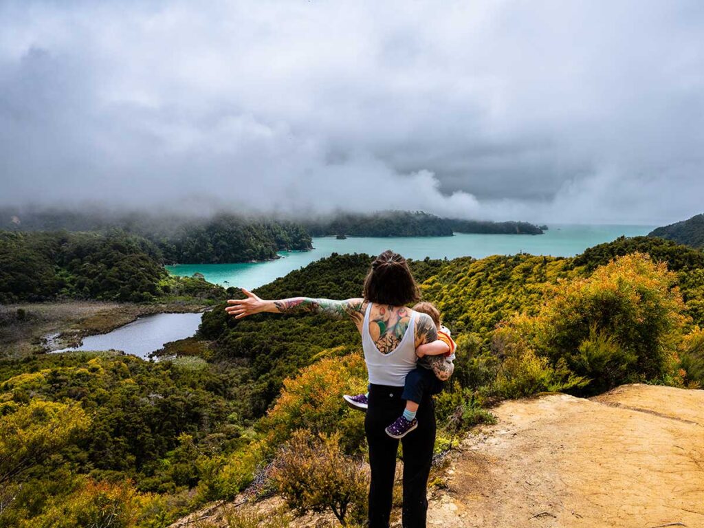 Mother holding toddler - Abel Tasman Coastal Track - New Zealand