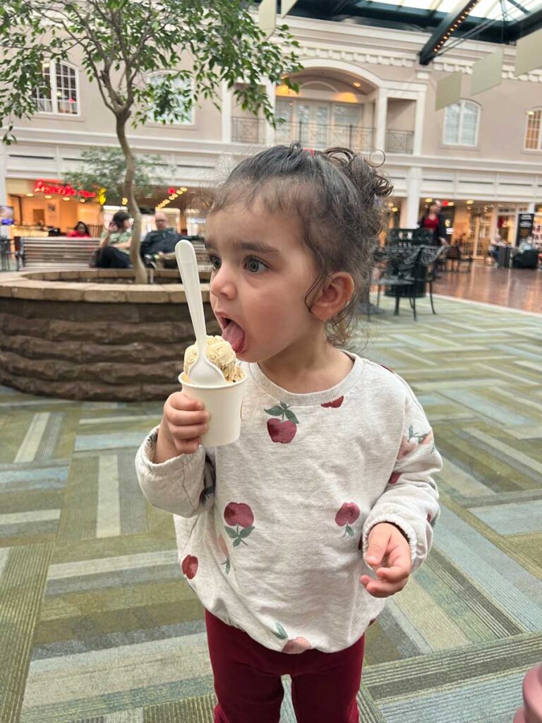 Toddler eating ice cream at Savannah airport