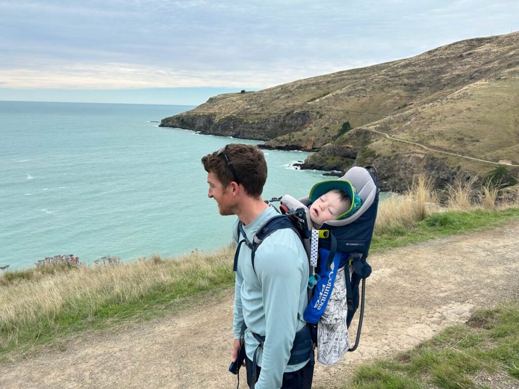 Toddler sleeping in Deuter Kid Comfort Active Carrier.