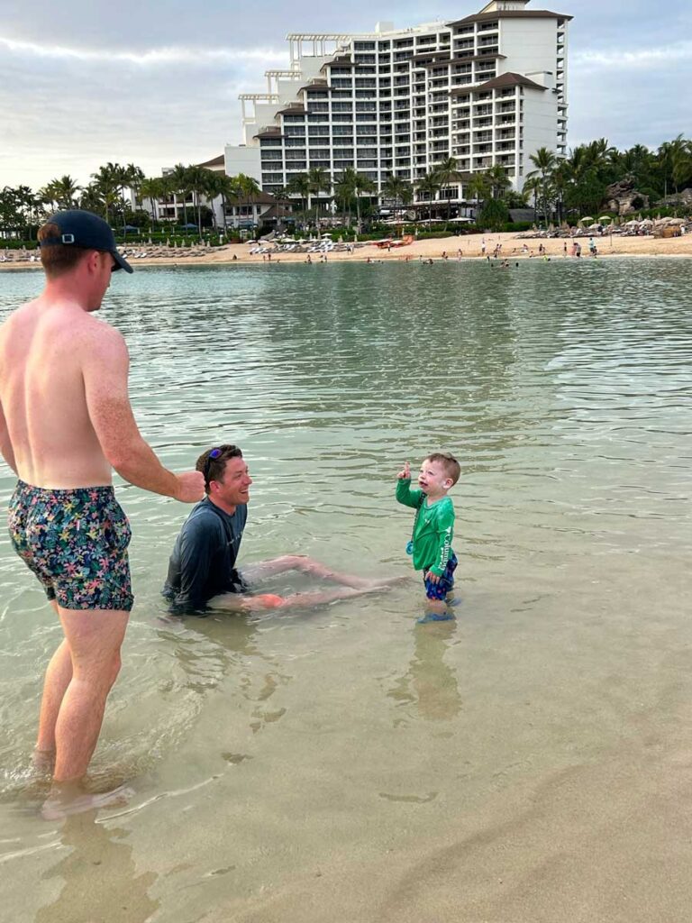 Toddler standing in water - Hawaii beaches with toddlers