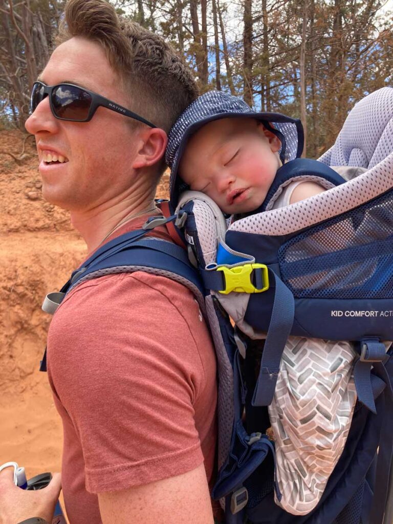 baby sleeping in Deuter Kid Comfort Active Carrier.