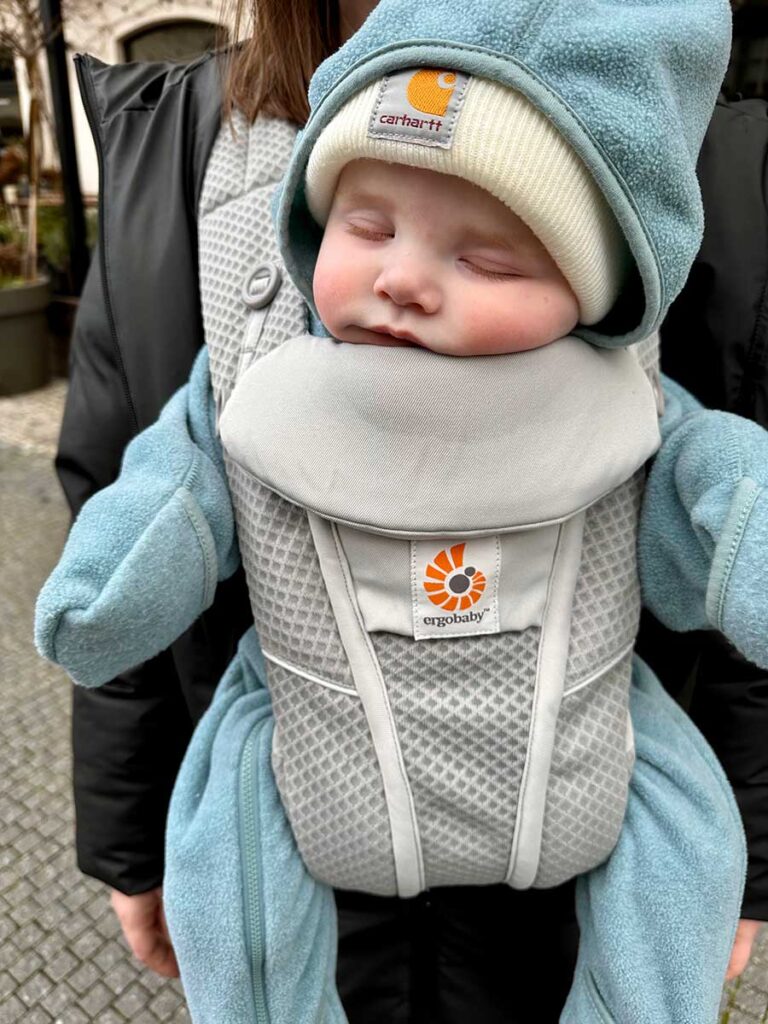 baby sleeping in baby carrier - Prague with a baby