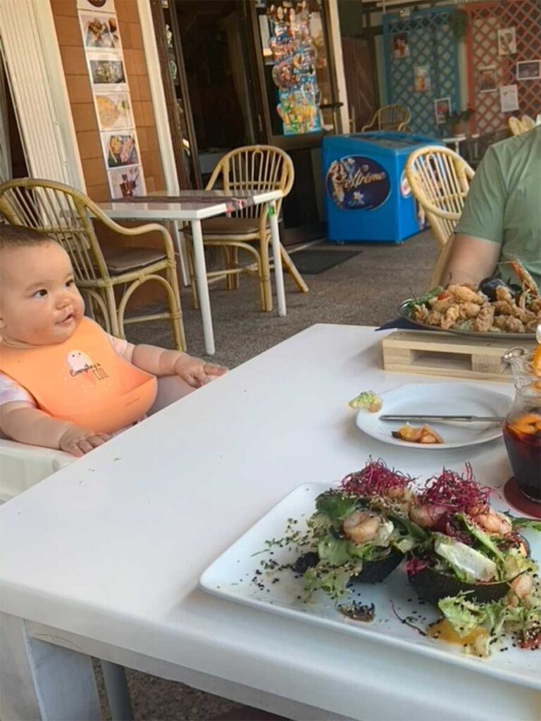 eating at restaurant in Mallorca with a baby