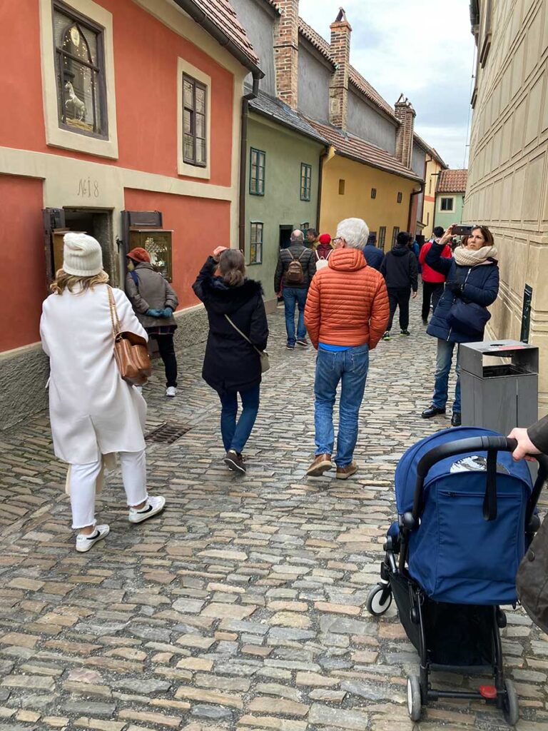 pushing stroller on cobblestone - Prague with a baby