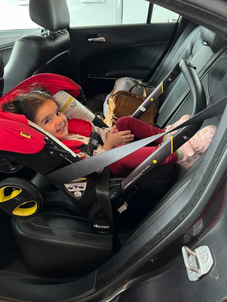 toddler in doona car seat