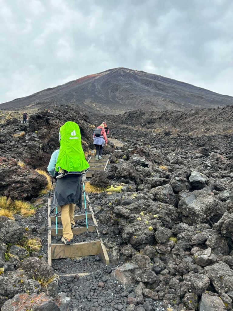 using rain cover on Deuter Kid Comfort Active Hiking Carrier.