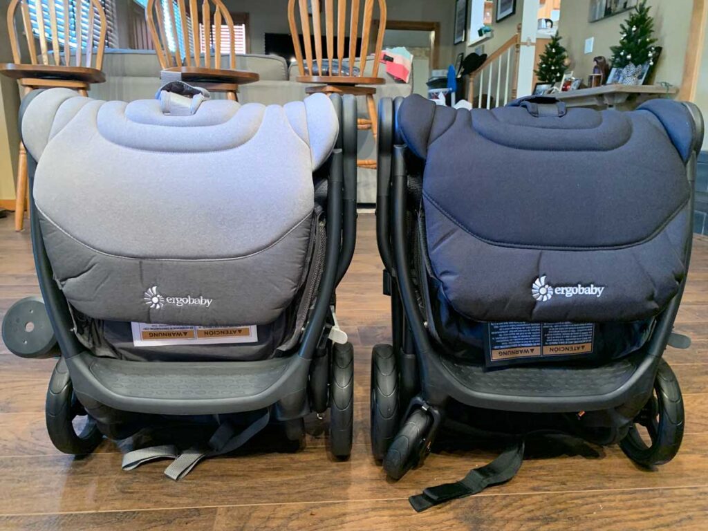 strollers side by side, folded.