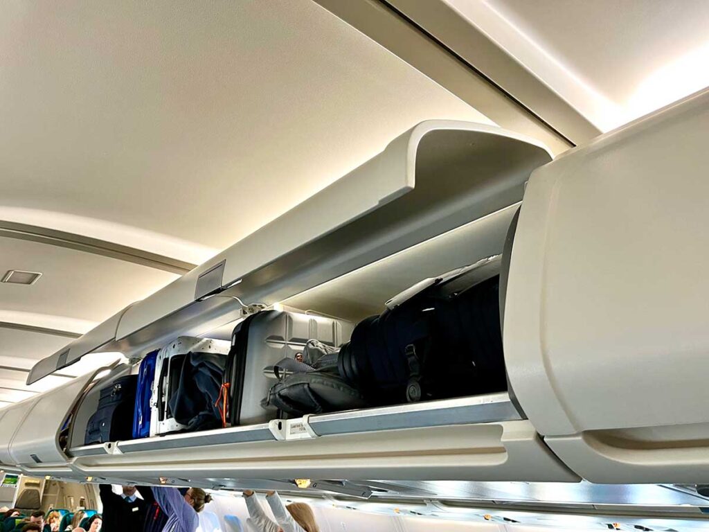 ErgoBaby Metro+ Stroller in overhead bin on airplane.