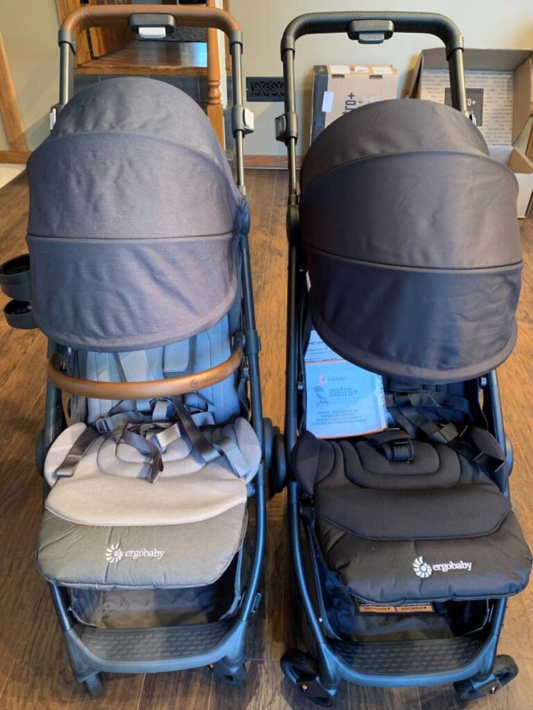 ErgoBaby Metro Strollers side-by-side with canopies extended.