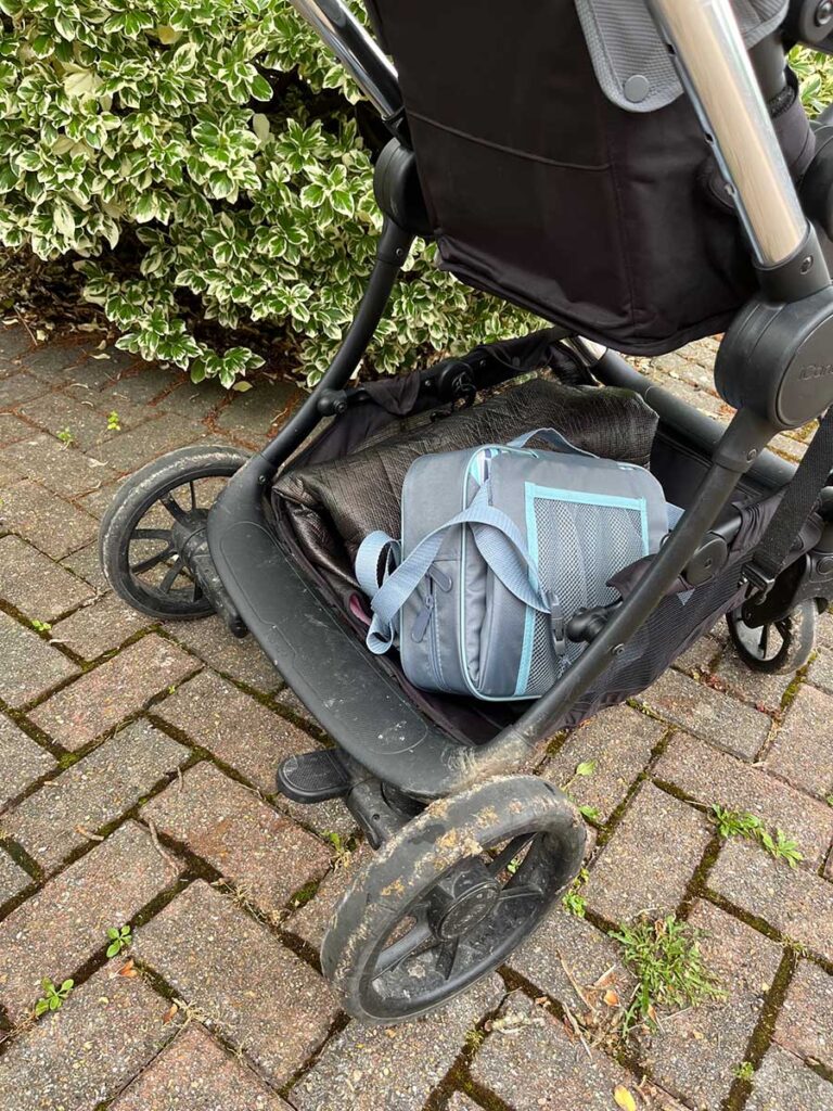 Nuby Easy Go Booster fits at bottom of stroller.