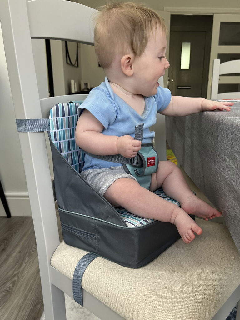 Using Nuby Easy Go Booster for baby travel high chair.