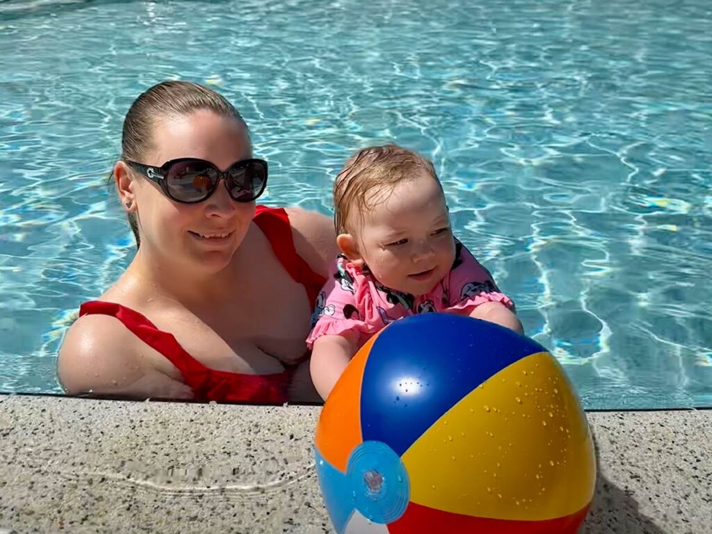 Mom and baby enjoying a swim at Disney.