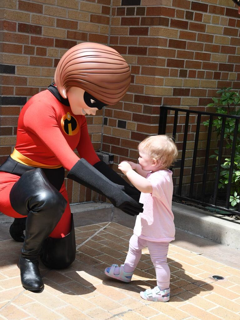 Baby with Elasta-gril at Disney.