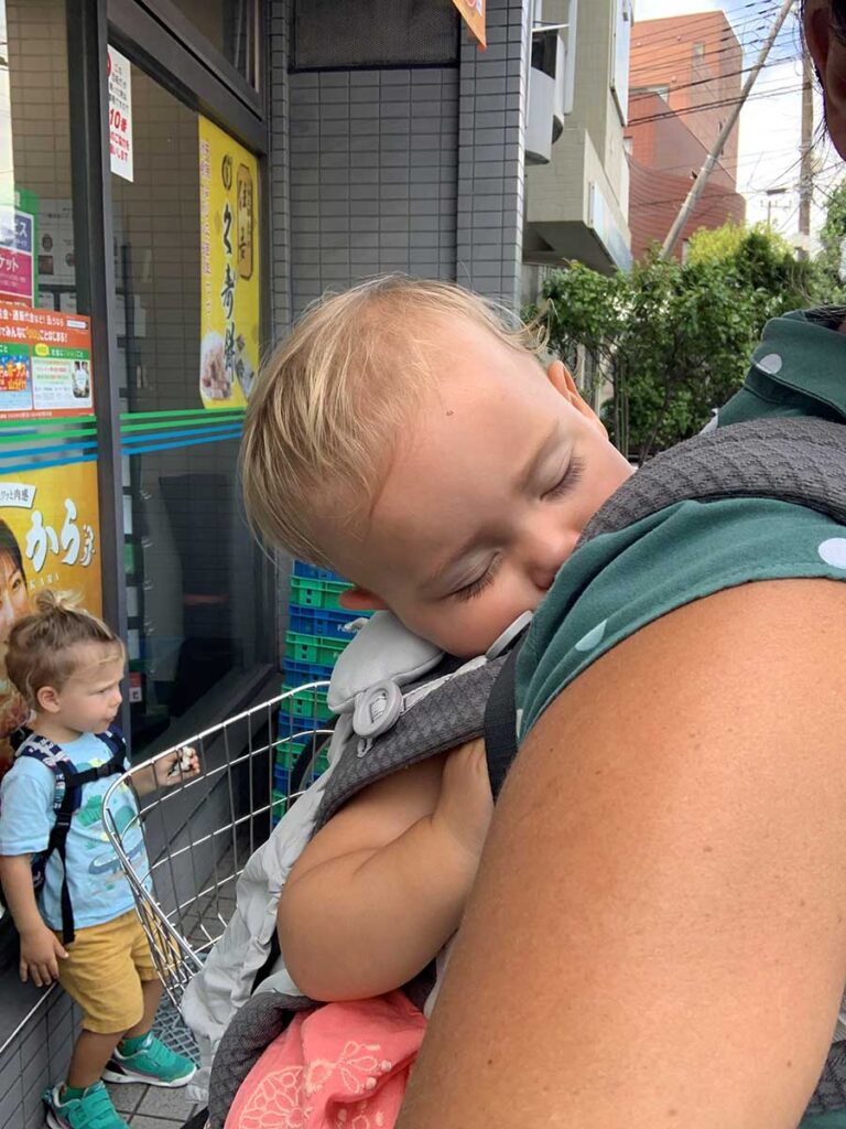 Baby sleeping in Ergobaby Omni Carrier.