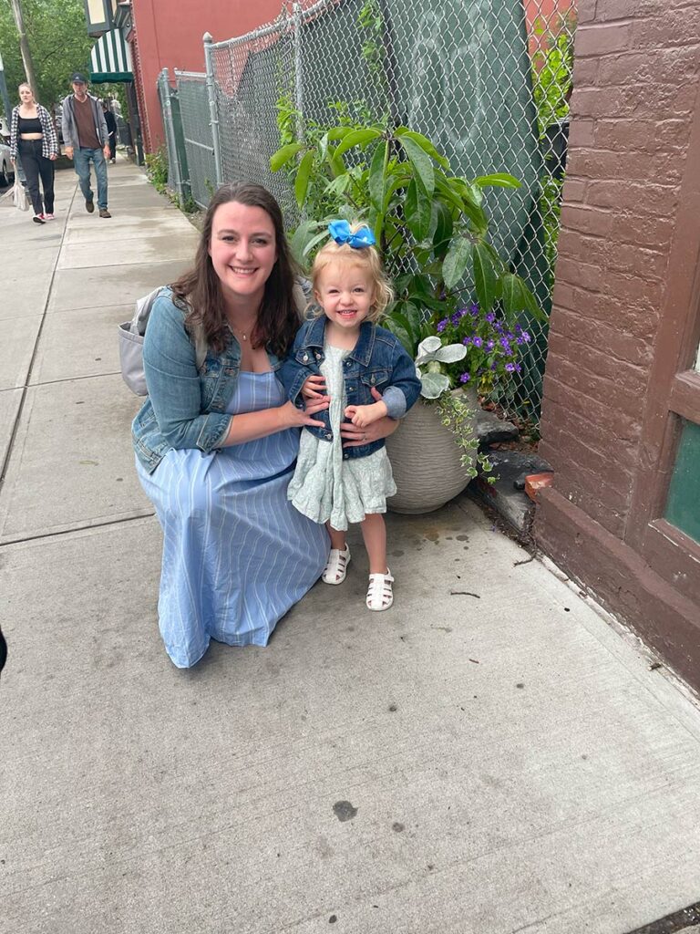 Woman and toddler smiling at the camera in San Juan, Puerto Rico.