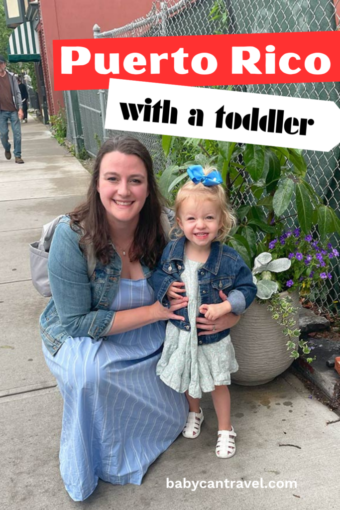 Woman and child smiling at the camera.